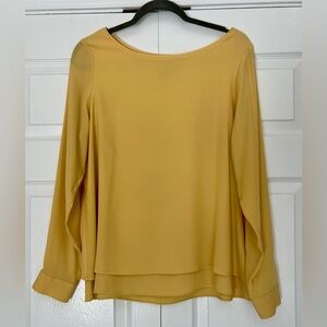 Yellow long sleeved White House Black Market blouse size 10, EUC.